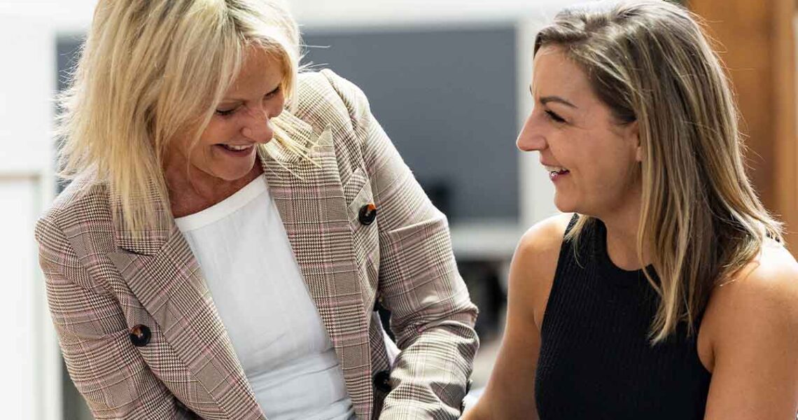 Kendra, founder of ko&co workhub and kendra creative sharing a laugh with Erin, founder of Hustle Tribe kickboaxing and HIIT gym and Hustle Tribe Fitness Retreats. South Melbourne