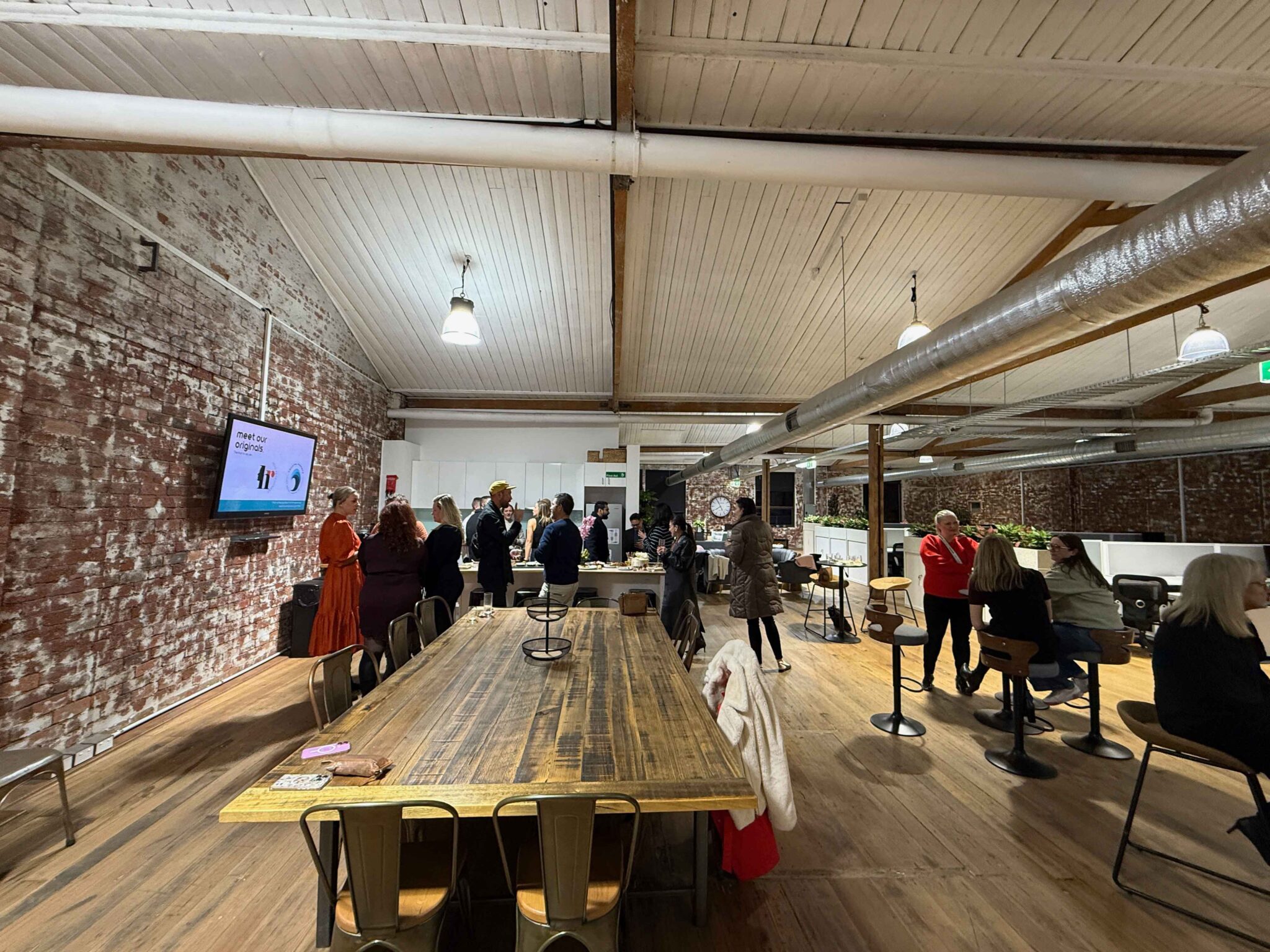 The gathering space at ko&co workhub in South Melbourne, styled for the launch event with guests enjoying the evening