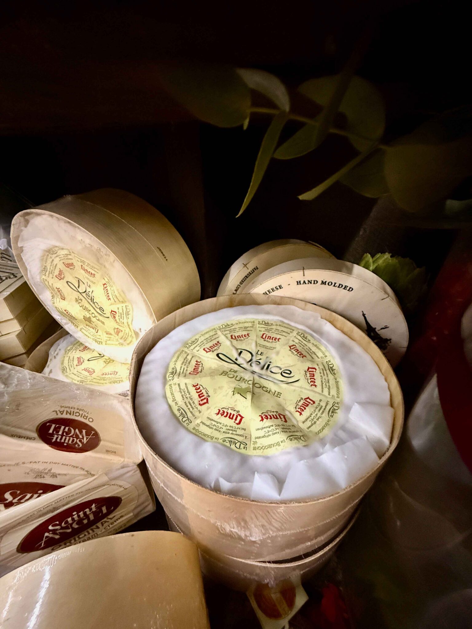 Wheel of triple brie cheese at Emerald Hill Provedore , South Melbourne Market for ko&co workhub's launch grazing table