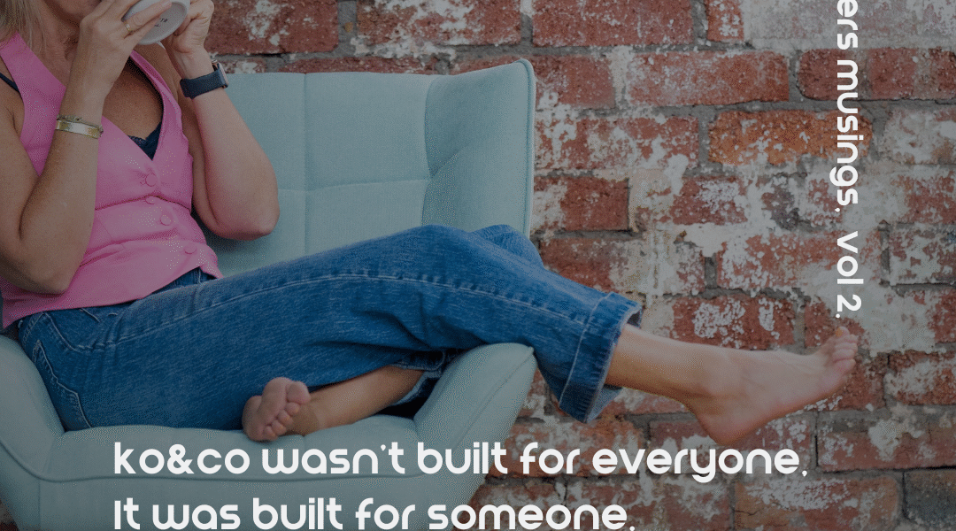 Kendra Overall, founder of ko&co workhub, sitting barefoot in a mint green armchair, sipping coffee and smiling toward the camera, with exposed brick wall in the background. Text overlay reads: “ko&co wasn’t built for everyone. It was built for someone.”