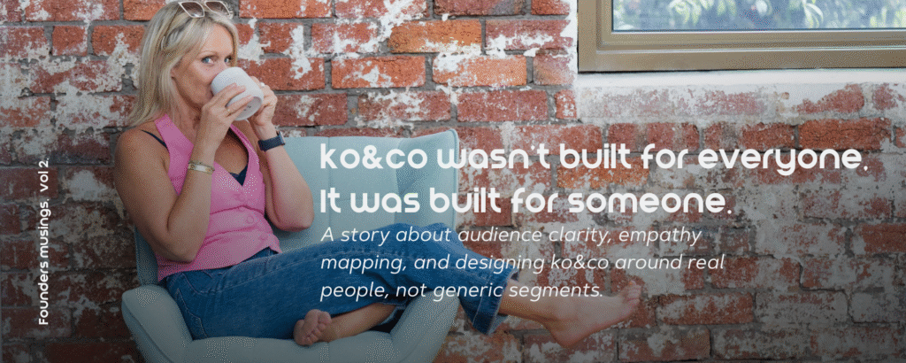 Kendra Overall, founder of ko&co workhub, sitting barefoot in a mint green armchair, sipping coffee and smiling toward the camera, with exposed brick wall in the background. Text overlay reads: “ko&co wasn’t built for everyone. It was built for someone.” 2